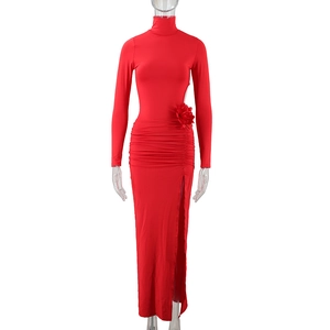 Detail of red high neck dress featuring 3D flower decoration and ruched waist design