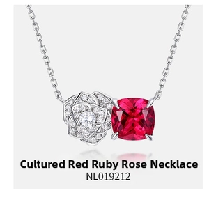 Macro detail of lab-grown ruby rose necklace with square cut gem and pavé petals