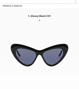 Glossy black cat-eye sunglasses with dark tinted lenses on a clean white background