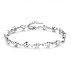 Elegant 925 sterling silver heart bracelet with sparkling cubic zirconia for women