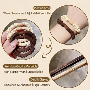 Thick high-elastic nylon scrunchies in brown and beige with stylish decorative beads