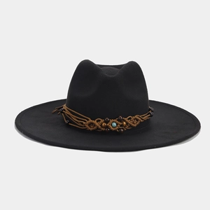 Detail of black wool fedora featuring a woven band with brown and turquoise beads