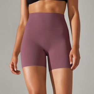 Detailed texture of high-waisted plum yoga shorts with brushed nude-feel fabric