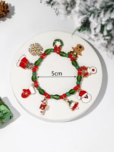 Detailed view showing 5cm diameter of Christmas charm bracelet with festive pendants