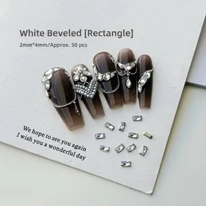 Detail of 2x4mm rectangular white zircons on nails, pack of 50 sparkling nail art crystals