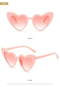 Front and 45-degree angle view of pink heart-shaped glitter sunglasses with gradient lenses