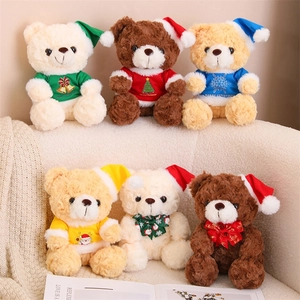 Detailed view of six Christmas teddy bears in festive outfits on a cozy sofa