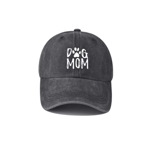 Macro shot of dark grey washed denim baseball cap with white DOG MOM text and paw print