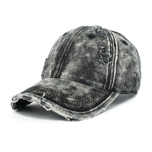 Distressed washed denim baseball cap with ripped details and curved brim in charcoal grey