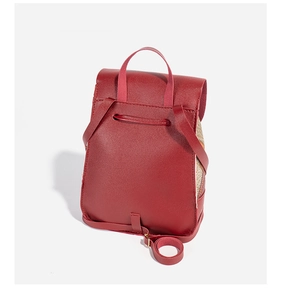 Rear view of red PU leather backpack with adjustable shoulder straps and drawstring