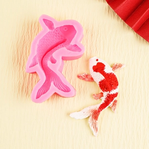 Pink silicone koi fish mold for fondant cake decorating and DIY chocolate crafting