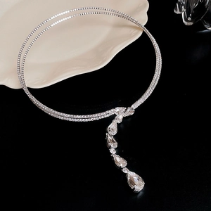 Macro view of silver rhinestone choker with layered pear-cut crystal fringe drops