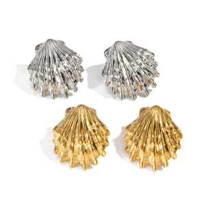 Minimalist shell-shaped stud earrings in gold and silver finish with textured metal ribs