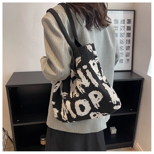 Fashionable large knit tote bag with black and white artistic letters for women
