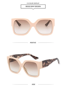 Detalle de gafas de sol cuadradas beige con patillas de carey y lentes degradadas