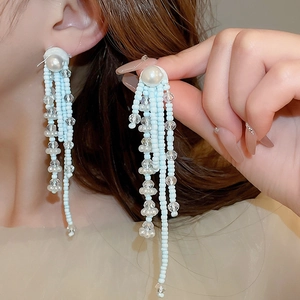 Elegant long fringe earrings with light blue seed beads and pearls for women
