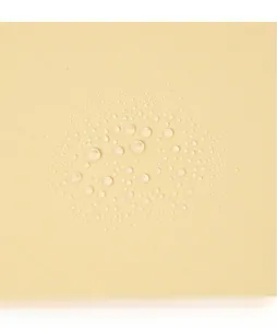 Detail of yellow waterproof PP cover with clear water droplets showing hydrophobic surface