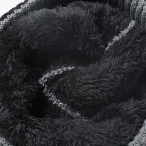 Close-up of thick thermal fleece lining on a winter knit beanie for maximum warmth