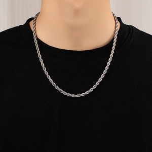 Minimalist silver twist rope chain necklace worn by a male model for everyday fashion