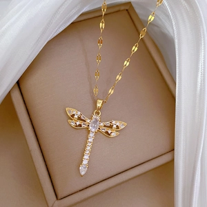 Titanium steel dragonfly necklace with zircons displayed in a beige jewelry gift box