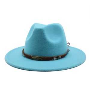 Detail of light blue wool fedora hat featuring a brown band with a vintage metal buckle