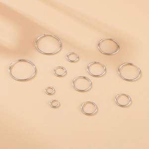 Multiple sizes of polished 304 stainless steel hoop earrings in a silver finish set