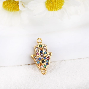 Close-up of 14K gold plated Hamsa hand charm with colorful cubic zirconia stones