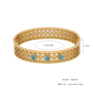 Detail view of hollowed stainless steel bracelet with oval turquoise stones and size info