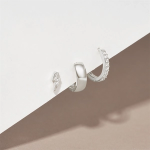Detailed view of silver 925 sterling silver earring set with lightning bolt and zircons
