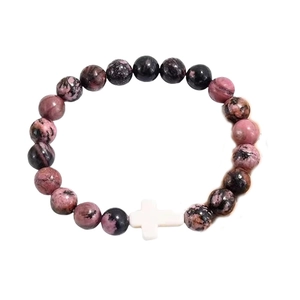 Pink zebra jasper beaded bracelet with a white cross charm on a clean white background