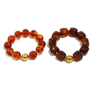 Retro amber acrylic beaded bracelets with gold accent beads in round and square shapes