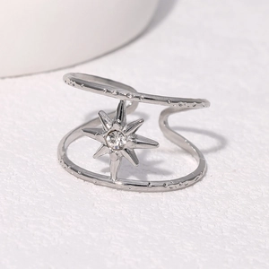 Minimalist silver dual-band open ring featuring an eight-pointed star and zircon stone