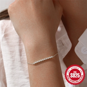 Elegant 925 sterling silver bracelet with a row of sparkling cubic zirconia stones