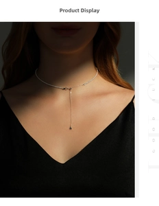 Detail view of s925 silver Y-shaped necklace featuring a shimmering star pendant on model