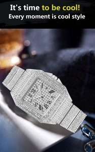 Close-up of silver square quartz watch with iced-out crystals and Roman numerals