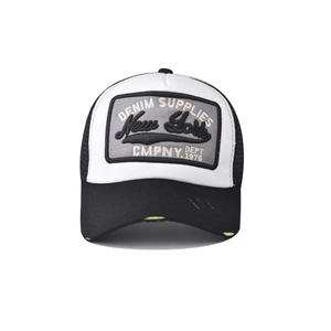 Detail of 3D New York embroidery and distressed brim on vintage mesh trucker hat