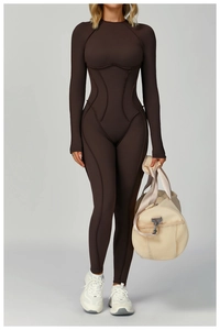 Front view of dark coffee long sleeve yoga jumpsuit with contouring stitching detail