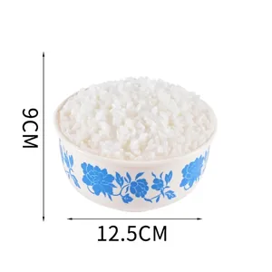 Close-up of artificial rice bowl prop with blue floral pattern, size 12.5x9cm