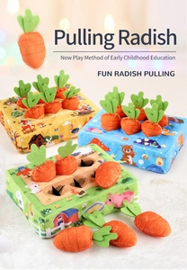 Close-up of plush farm-themed base with soft colorful pull-out carrots toy