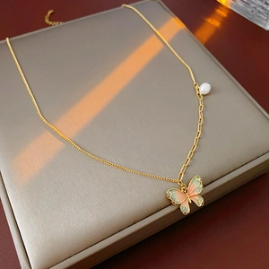 Elegant gold-plated butterfly necklace with colorful enamel pendant and white pearl detail