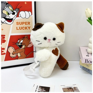 Detail of cute calico cat plush bag with adjustable strap and soft embroidered face