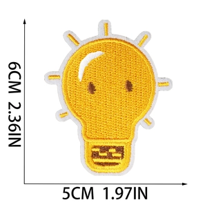 Detailed size view of yellow light bulb embroidery patch with 6cm x 5cm dimensions