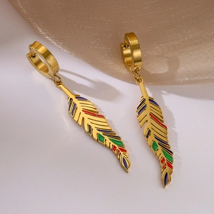 Bohemian gold feather drop earrings with colorful enamel eye charms on silk background