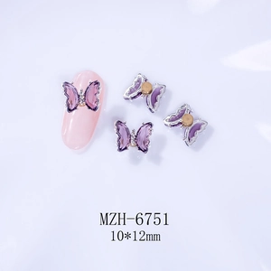 Detailed view of purple 3D crystal butterfly nail charms with silver metal base 10x12mm