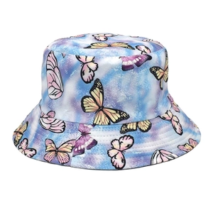 Detail of butterfly pattern on tie-dye reversible bucket hat with blue-purple gradient