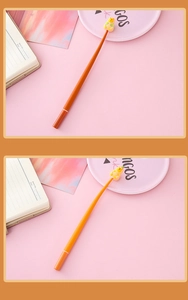 Close-up of cute bear topper gel pens in orange and yellow on a pink background
