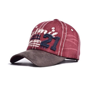 Detail of vintage baseball cap with embroidery, color blocking, and contrast stitching
