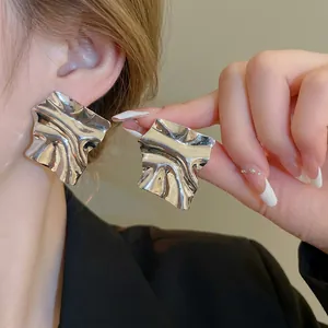 Chic silver pleated square stud earrings with irregular folded texture for women