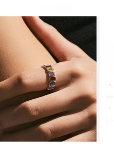 Close-up of s925 silver eternity ring with colorful rectangular-cut zircon stones