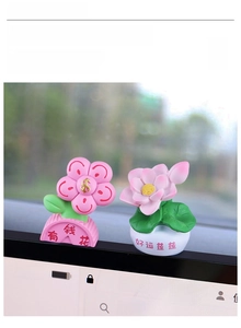 Cute resin flower car dashboard ornaments featuring lucky symbols on screen edge